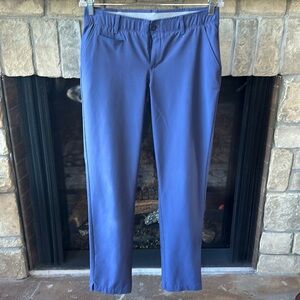 Under Armour blue stretch performance golf pants with pockets. Size 8.
